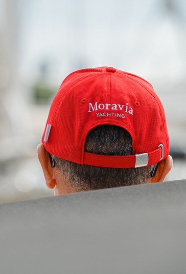 Moravia Yachting team member in branded cap